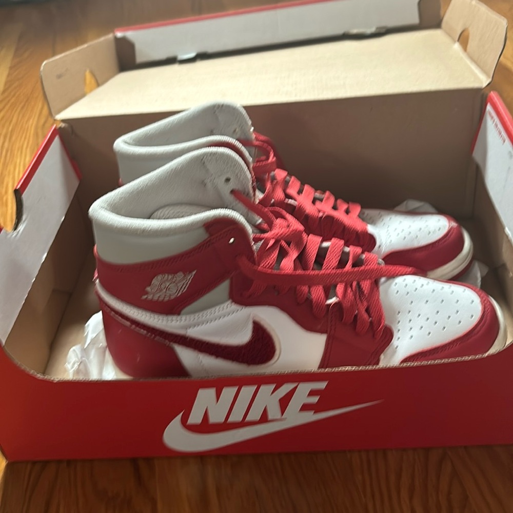 Red and white Nike shoes